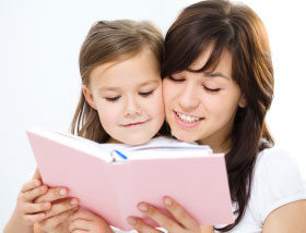 Mother reading to a child
